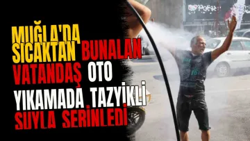 Muğla'da Sıcaktan Bunalan Vatandaş Oto Yıkamada Tazyikli Suyla Serinledi